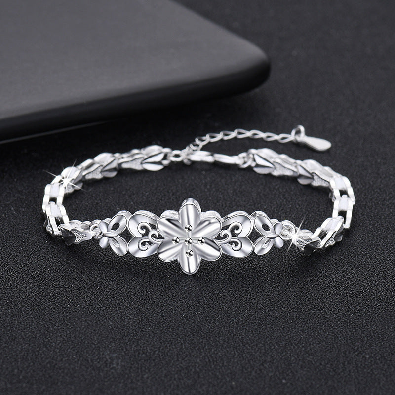 Damenarmband mit filigranem Blumendesign und elegantem Zirkonia-Besatz Shop Nory