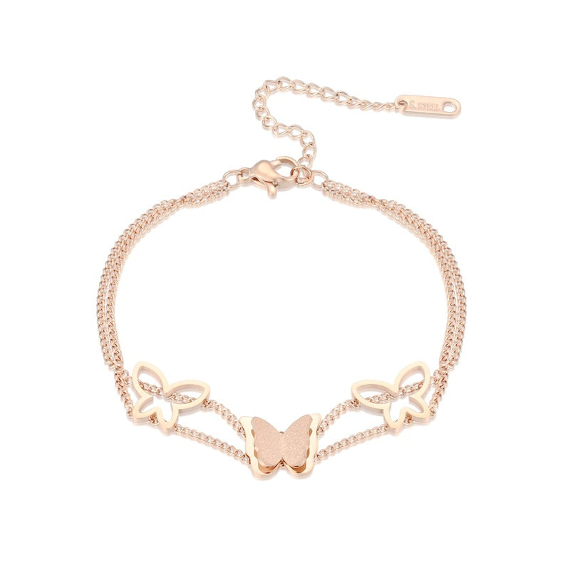 Damen Armreif mit filigranem Schmetterlingsdesign aus hochwertigem Edelstahl Shop Nory