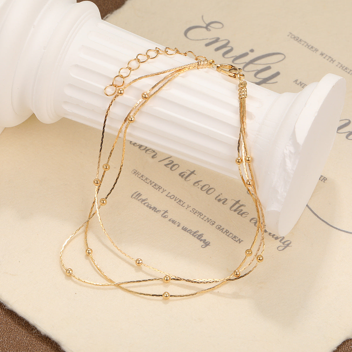 Damen Fußkettchen mit eleganten, goldenen Akzenten Shop Nory