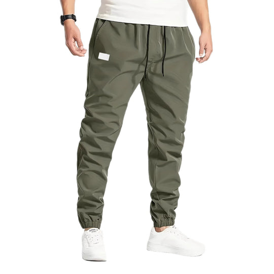 Herren Technische Jogginghose im Tapered‑Utility‑Stil mit elastischem Bund & Knöchelbündchen Shop Nory