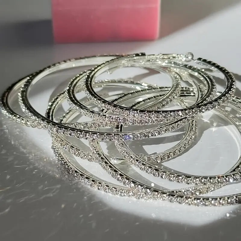 Damen Creolen mit funkelnden Zirkonia-Akzenten Shop Nory