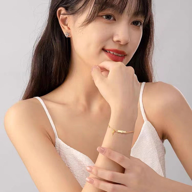 Damen filigranes Armband mit charmanten Anhängern Shop Nory