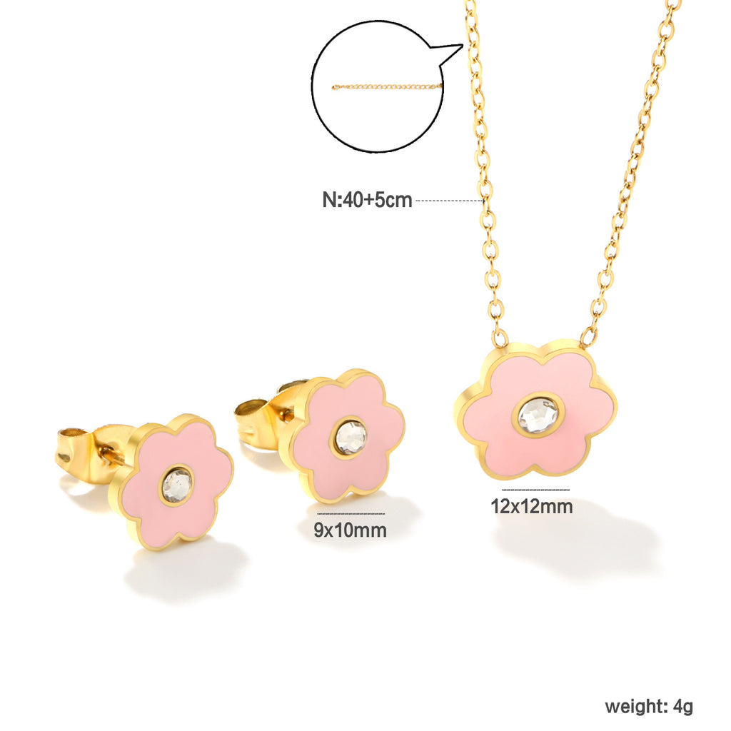 Damen Schmuckset mit modischem Kinderwagen-Anhänger und passenden Ohrsteckern Shop Nory