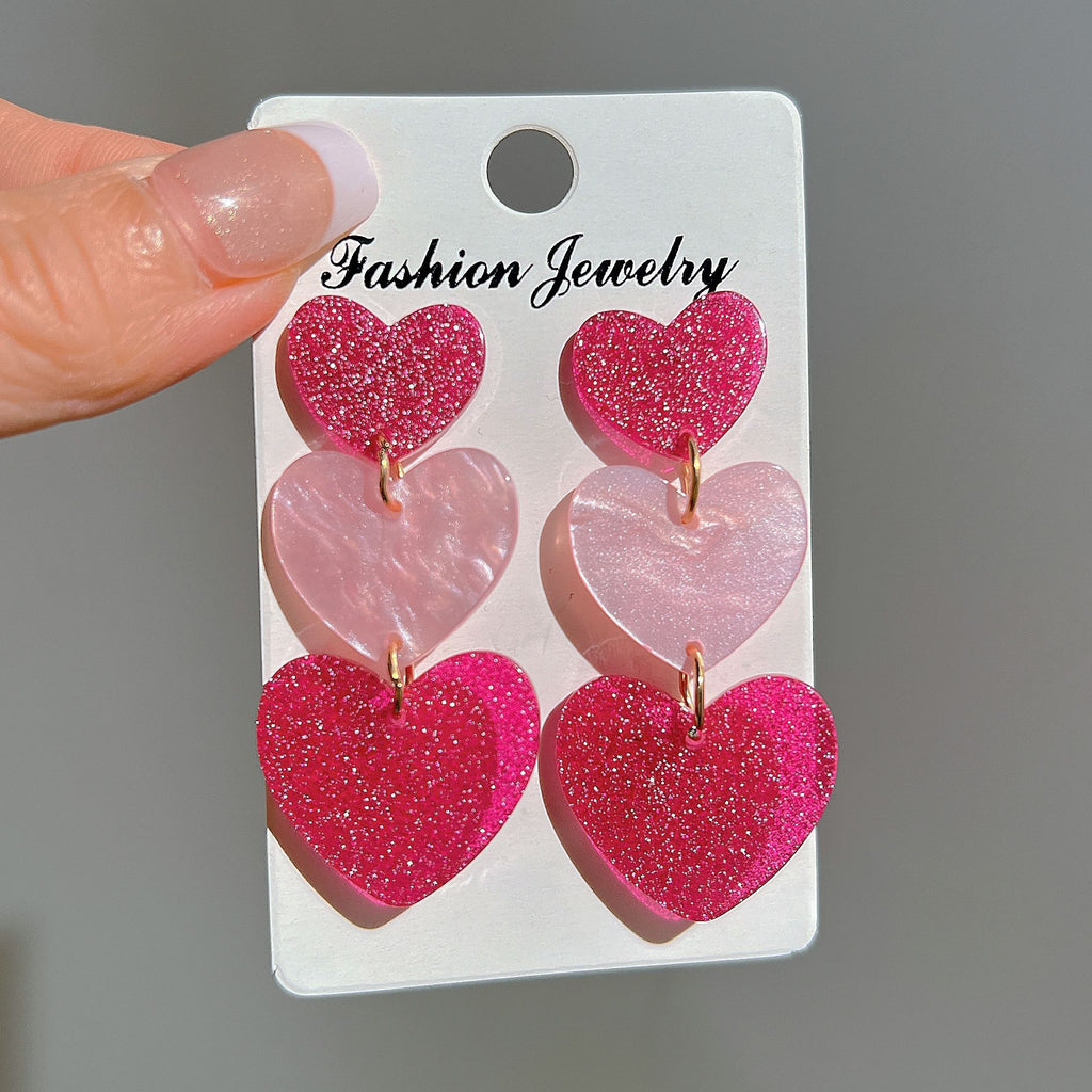 Damenohrringe mit funkelnden Herzanhängern aus hochwertigem Acryl Shop Nory