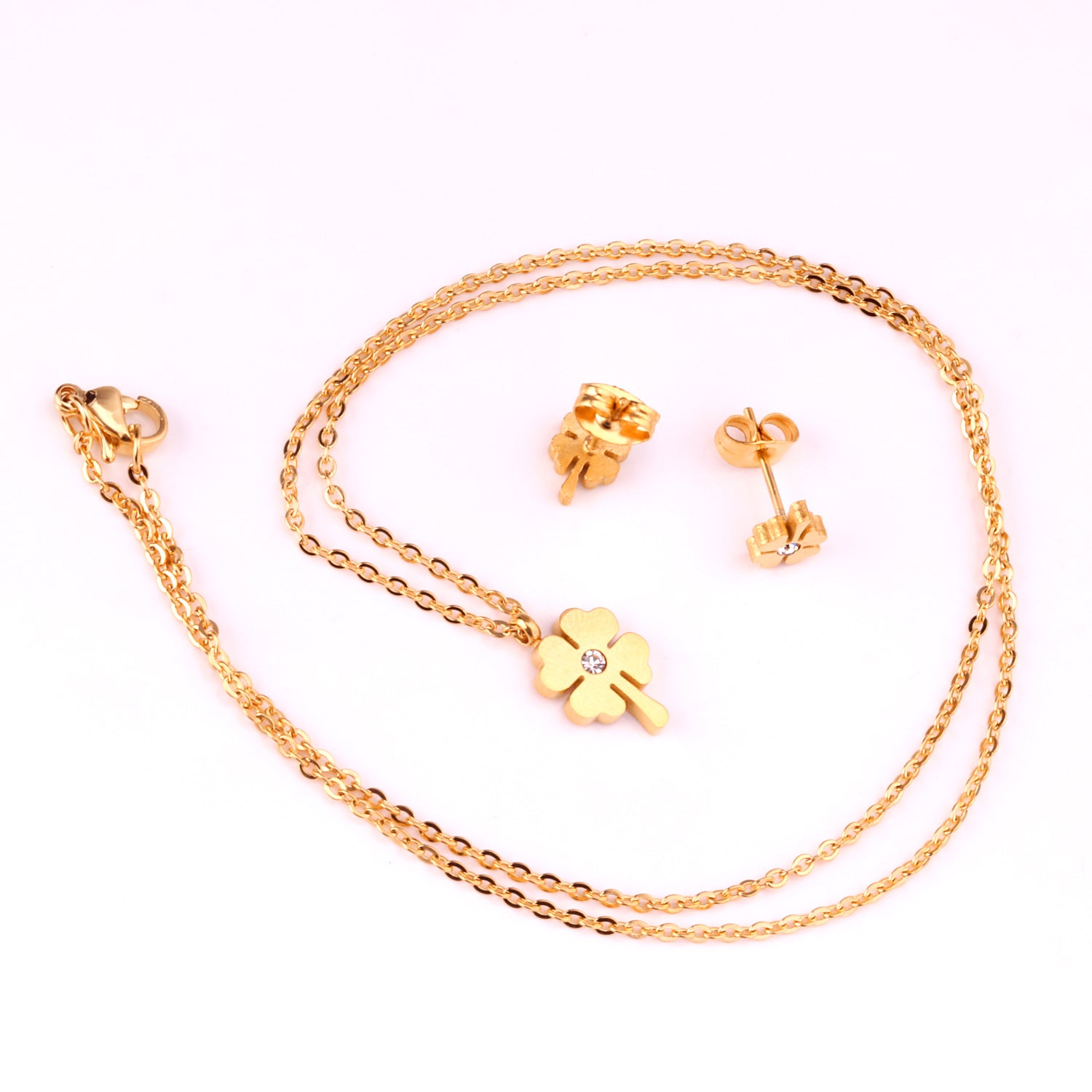 Damen Schmuckset mit herzförmigen Anhängern aus goldplattiertem Edelstahl Shop Nory