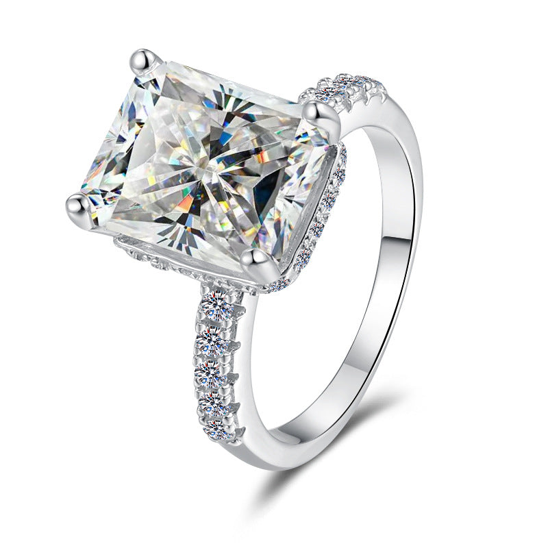 Damen Verlobungsring mit kunstvollem Zirkonia und elegantem Rahmen Shop Nory
