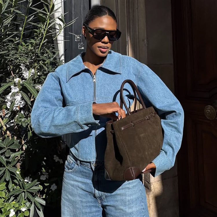 Damen Kurz geschnittene Jeansjacke mit Reißverschluss und definierter Schulterlinie Shop Nory