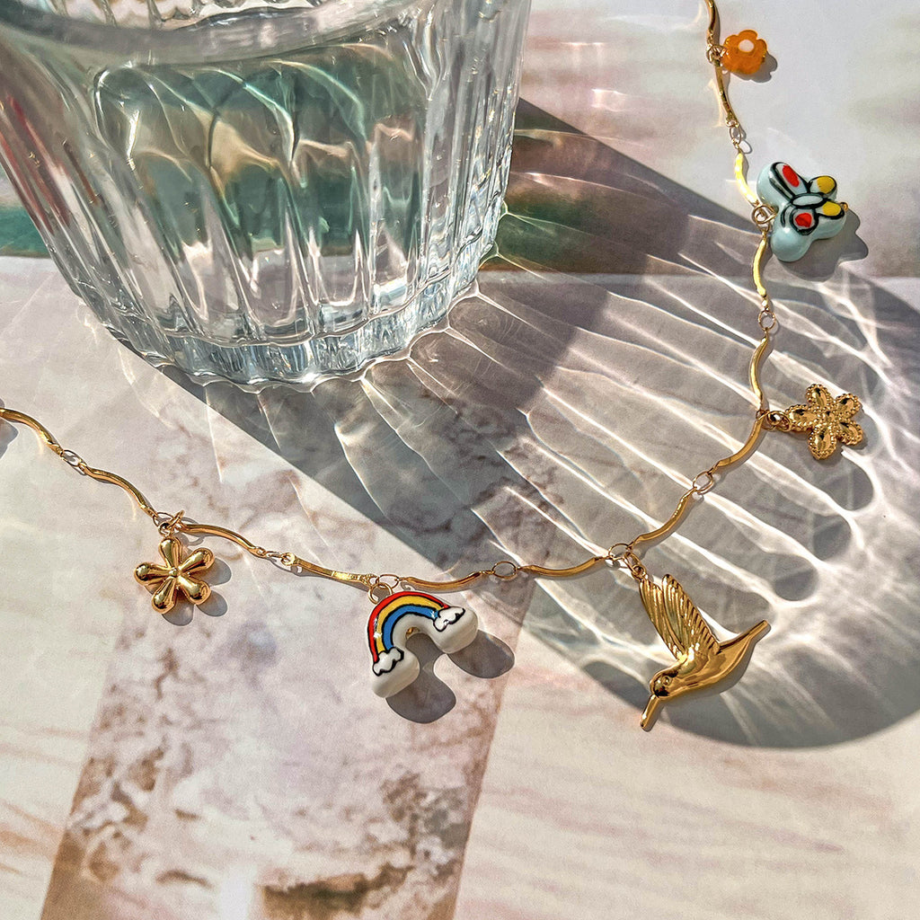 Damen Kette mit charmanten Anhängern aus hypoallergenem Edelstahl Shop Nory