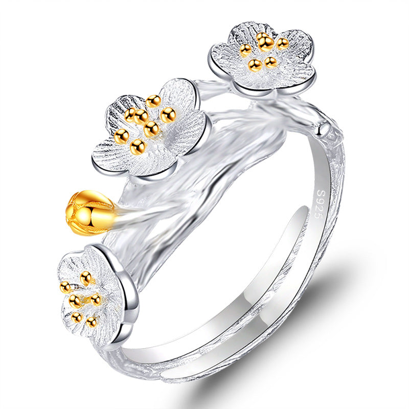 Damenring mit kunstvollem Blumenmuster und elegantem Zirkonia-Besatz Shop Nory