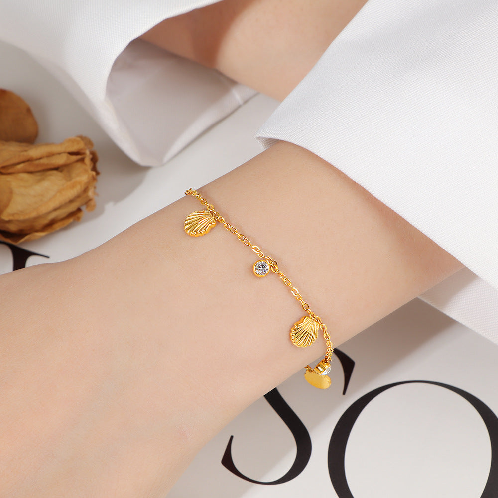 Damen zierliches Armband mit Muschel-Design und funkelndem Kristall Shop Nory