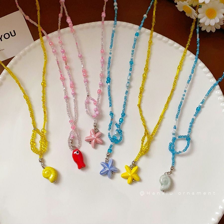 Damen Kette mit handgefertigtem Blumenanhänger Shop Nory