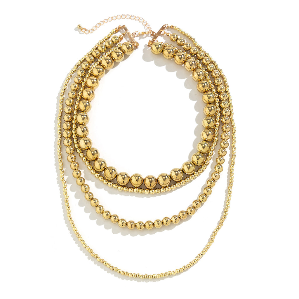 Damen mehrlagige Halskette mit glänzenden Metallkugeln und eleganten Designelementen