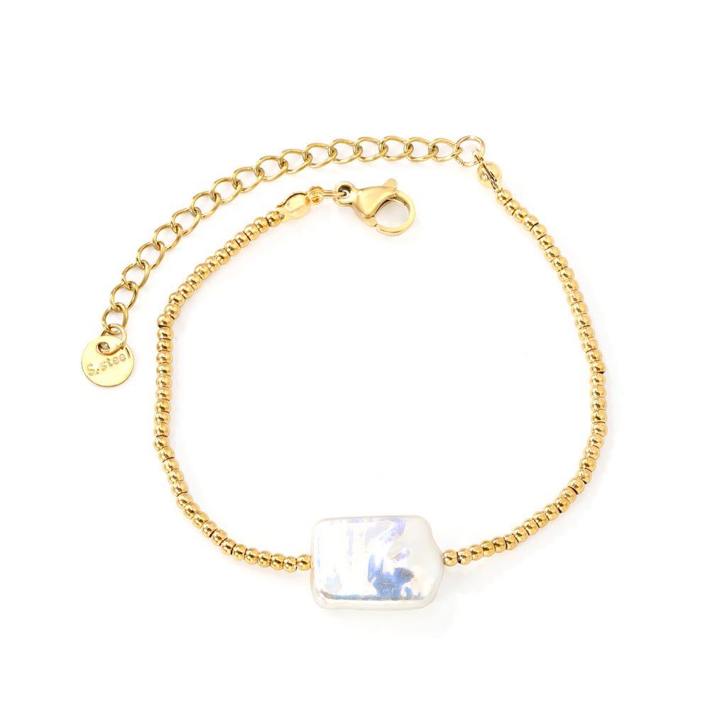 Damen Armband mit modernem Muschelanhänger und eleganten goldenen Akzenten Shop Nory
