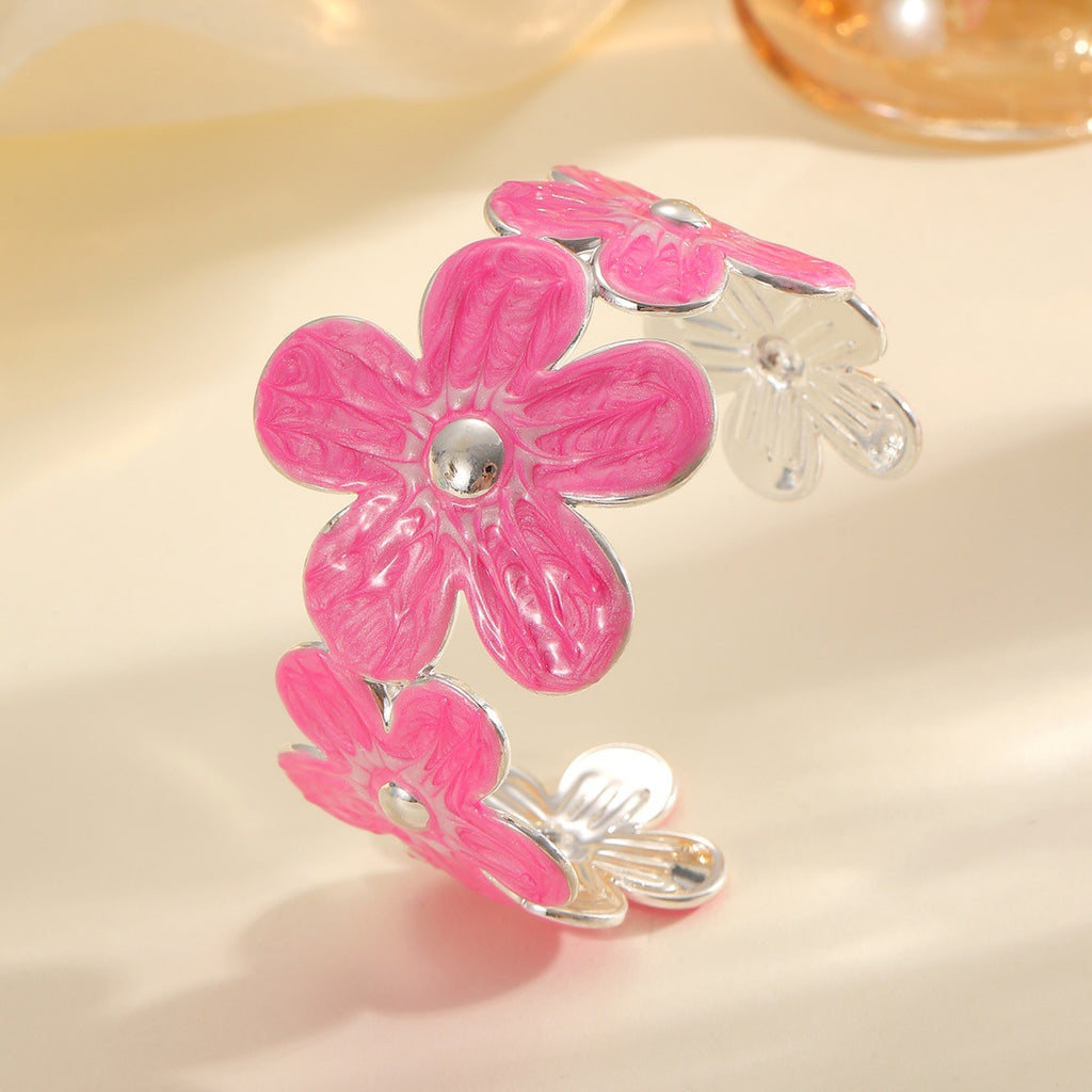 Damen Armreif aus hochwertigem Metall mit floralem Design Shop Nory