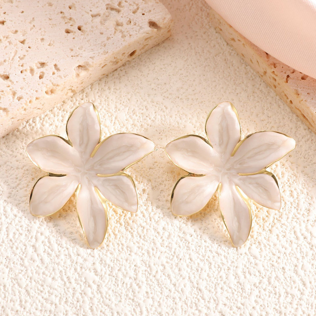 Damen Ohrringe mit floralem Design und elegantem Goldrand Shop Nory