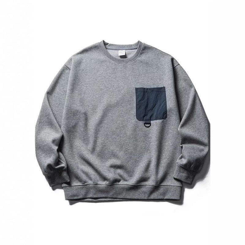 Unisex Oversize-Sweatshirt mit kontrastierender Brusttasche und D-Ring Shop Nory
