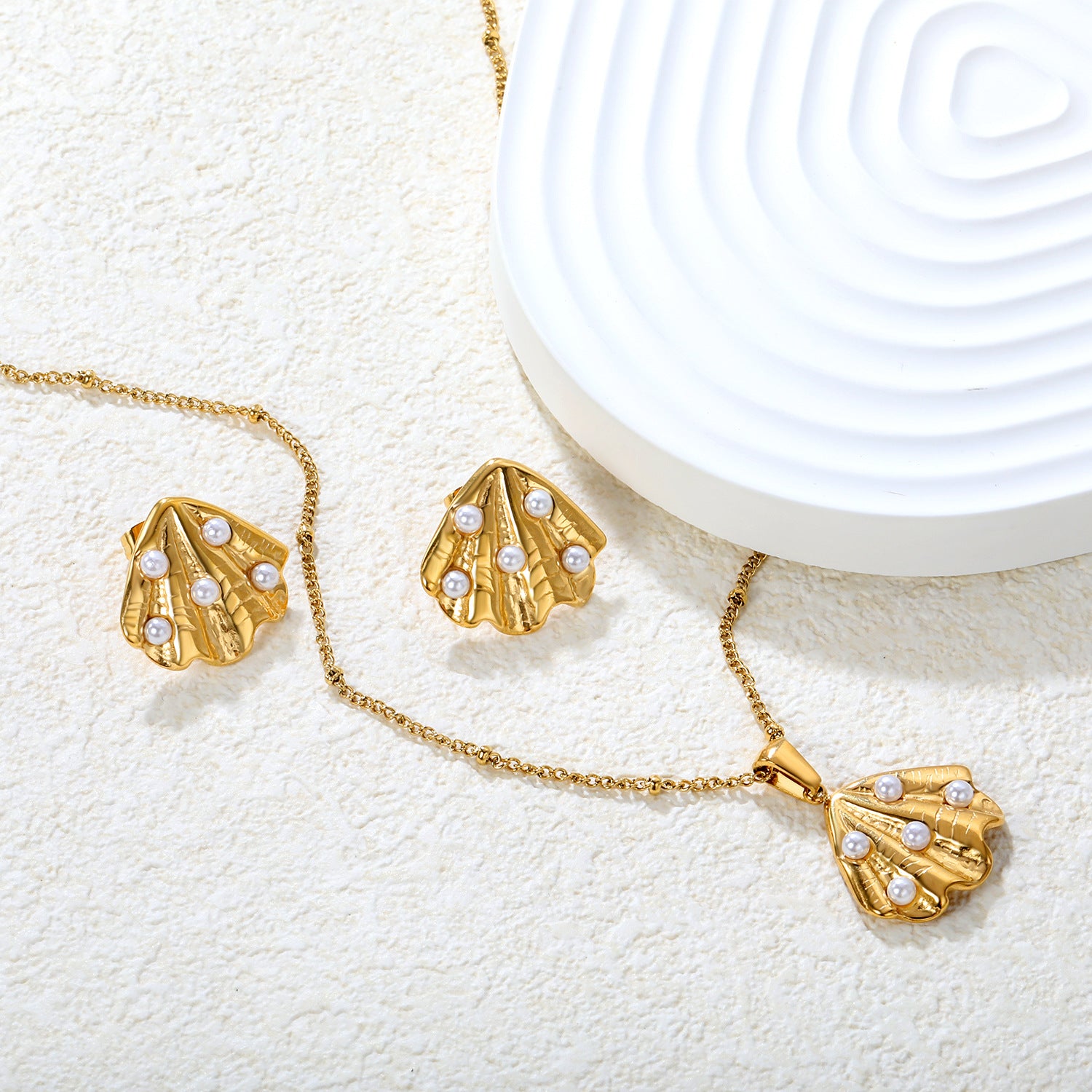 Damen Schmuckset mit Meeresmuschel-Anhänger und funkelnden Zirkonia Shop Nory