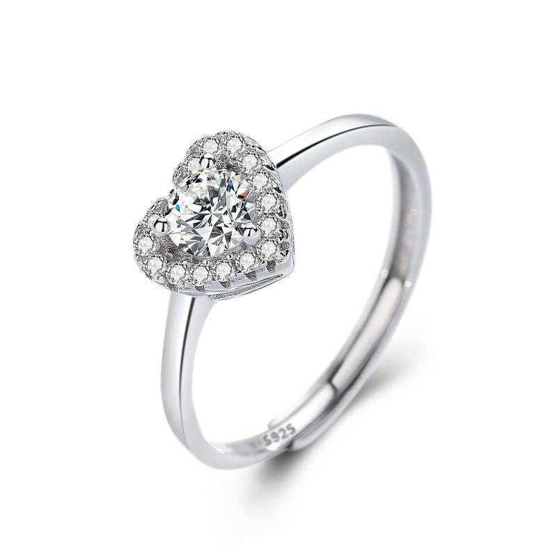 Damen eleganter Ring mit funkelndem Solitär und verspieltem Zirkonia-Besatz Shop Nory