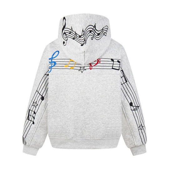 Damen Oversize Kapuzenpullover mit musikalischer Notenstickerei und geripptem Saum Shop Nory