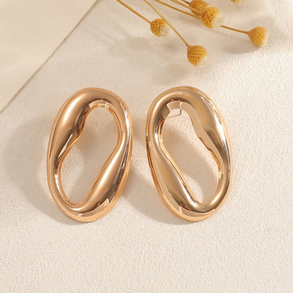 Damen Ohrringe mit modernem, skulpturalem Design Shop Nory