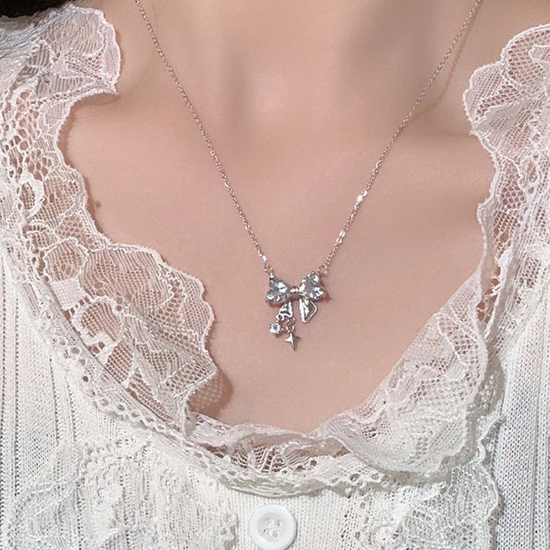 Damen zarte Halskette mit kristallinem Schleifenanhänger Shop Nory