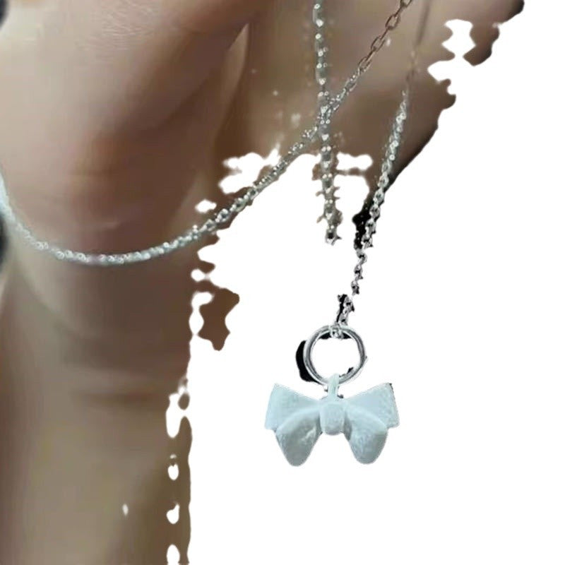 Damen Halskette mit filigranem Schleifenanhänger Shop Nory