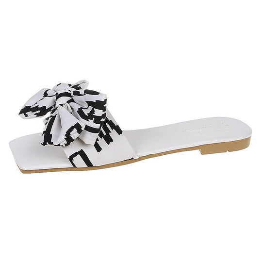 Damen Flache Riemen-Slides mit großem Stoffknoten und quadratischer Zehenpartie Shop Nory