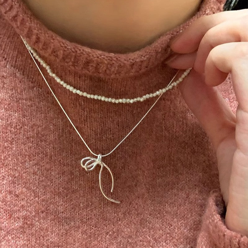 Damen Halskette mit elegantem Schleifenanhänger Shop Nory