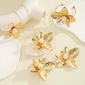 Damen Schmuckset mit floralen Anhängern und Perlenakzenten Shop Nory