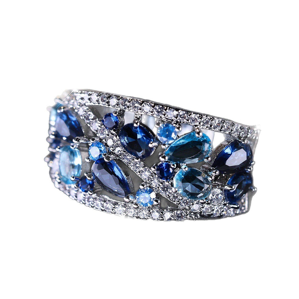 Damen Ring mit kunstvollem Rosé-Golddesign und funkelnden Zirkonia-Steinen Shop Nory