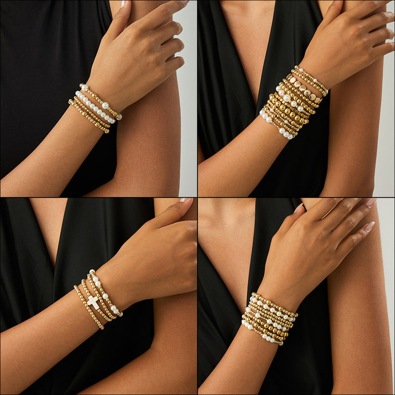 Damen mehrlagiges Armband mit Perlen und Metallakzenten Shop Nory