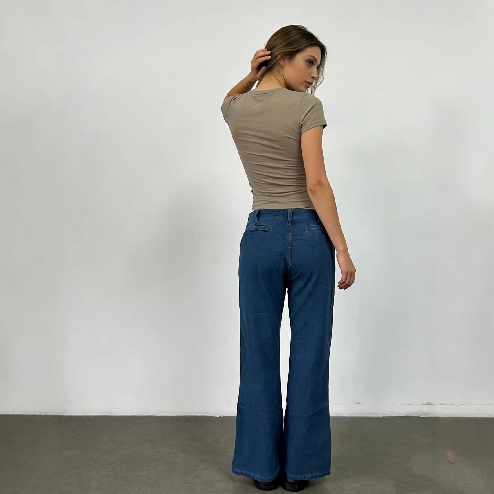 Damen Bootcut-Jeans mit hohem Bund und knöpfbarem Verschluss Shopnory