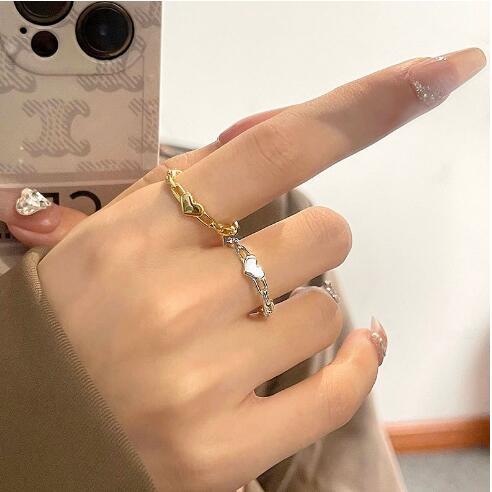 Damen Ring mit herzförmigem Design und filigraner Gliederstruktur Shop Nory