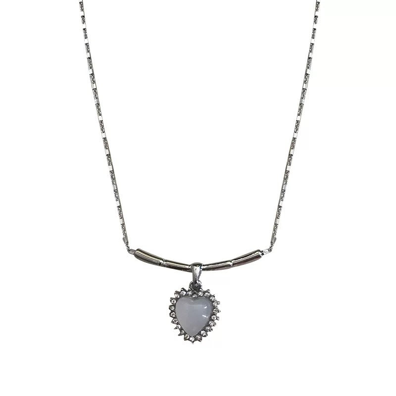 Damen Halskette mit herzförmigem Anhänger aus hochwertigem Edelstein und funkelnden Zirkonia Shop Nory