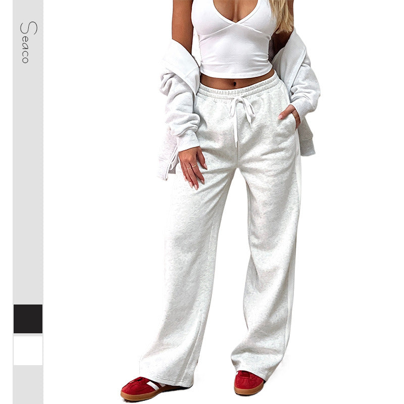 Damen weite High-Waist Jogginghose mit seitlichem Kontrast-Streifen und Taschen Shop Nory