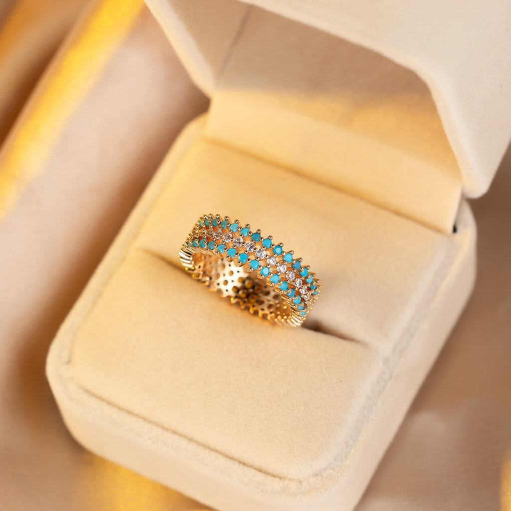 Damen Ring mit funkelnden aquamarinen und glitzernden Zirkonia-Details Shop Nory