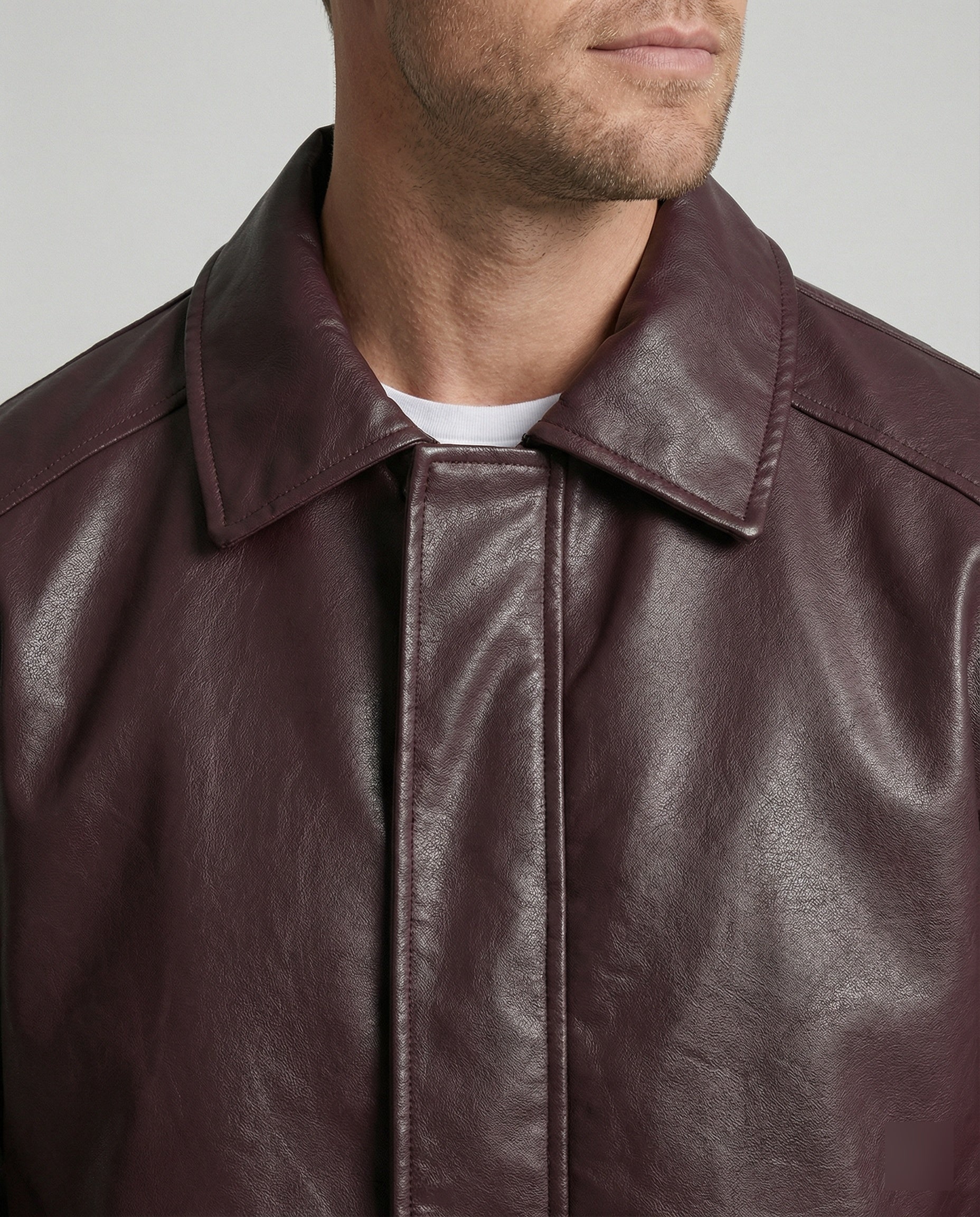 Herren oversized Lederimitat-Zipjacke mit Hemdkragen kastiger Silhouette und Einschubtaschen