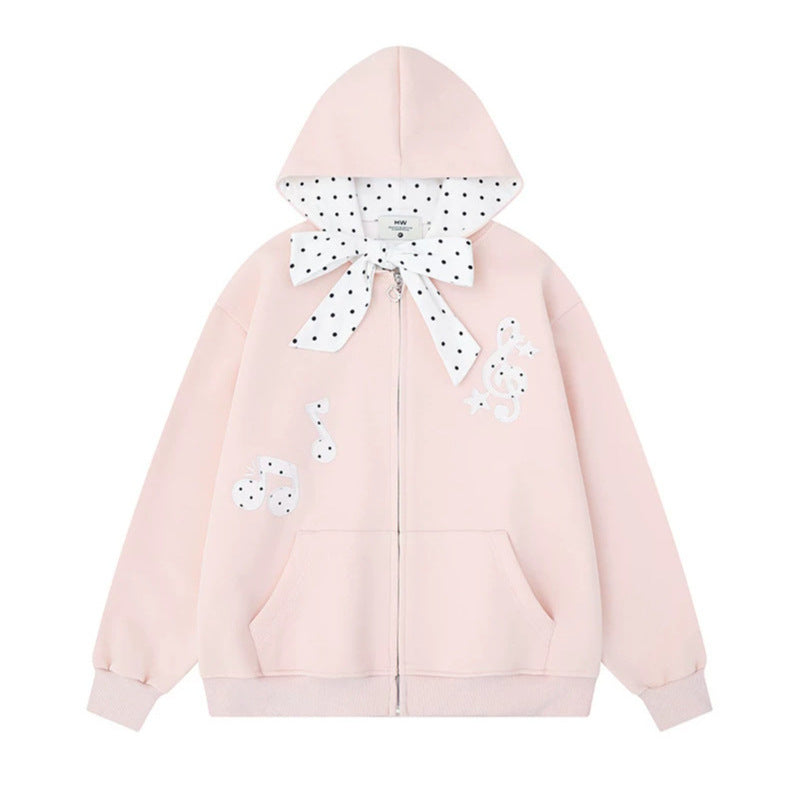 Damen Kapuzensweatjacke mit gepünktetem Kapuzenfutter, dekorativer Schleife und Notenmotiv Shop Nory