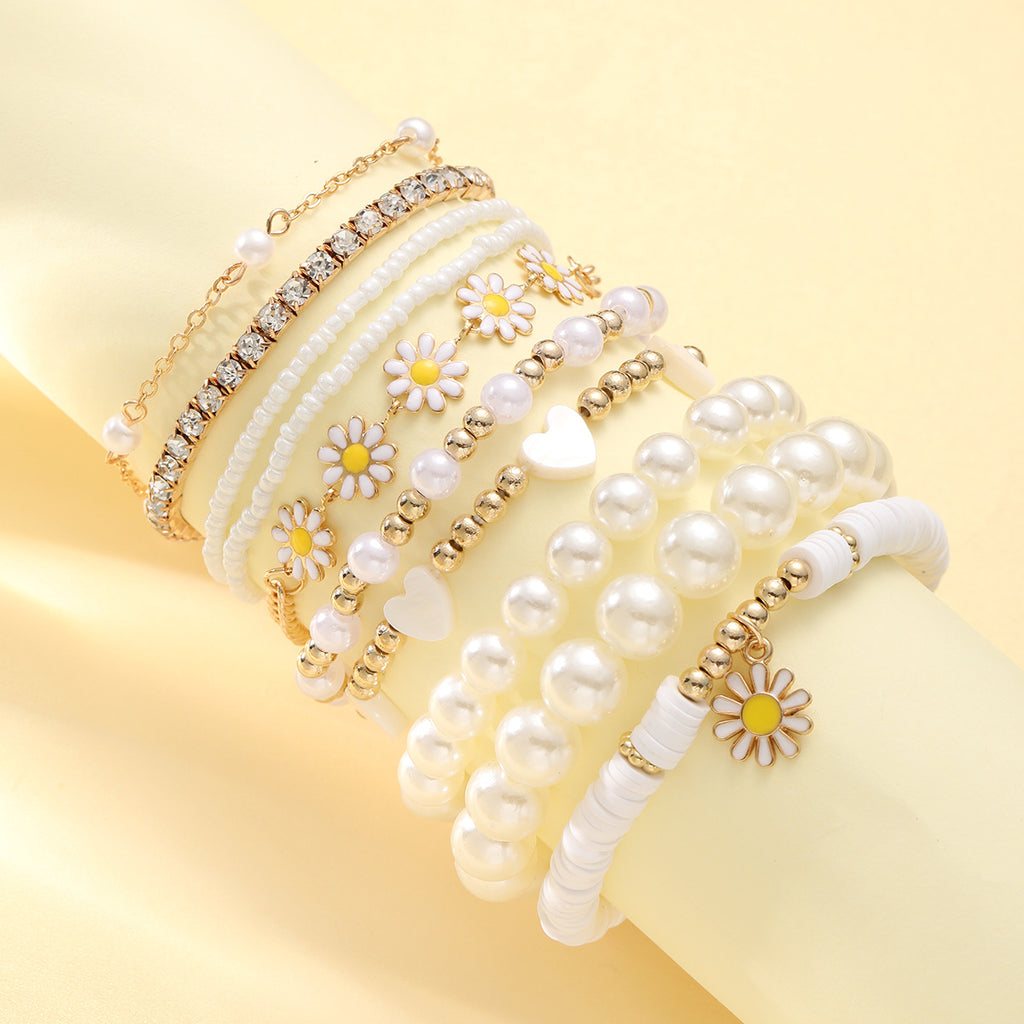 Damen Armband-Set mit stilvollen Perlen und bunten Blumenanhängern Shop Nory