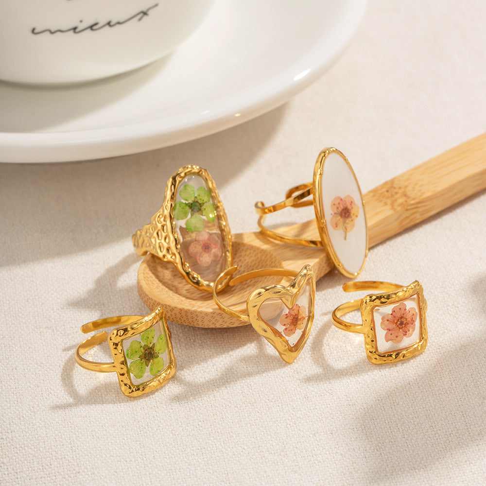 Damen Offener Ring mit charmanten floralen Motiven und hypoallergener Edelstahlverarbeitung Shop Nory