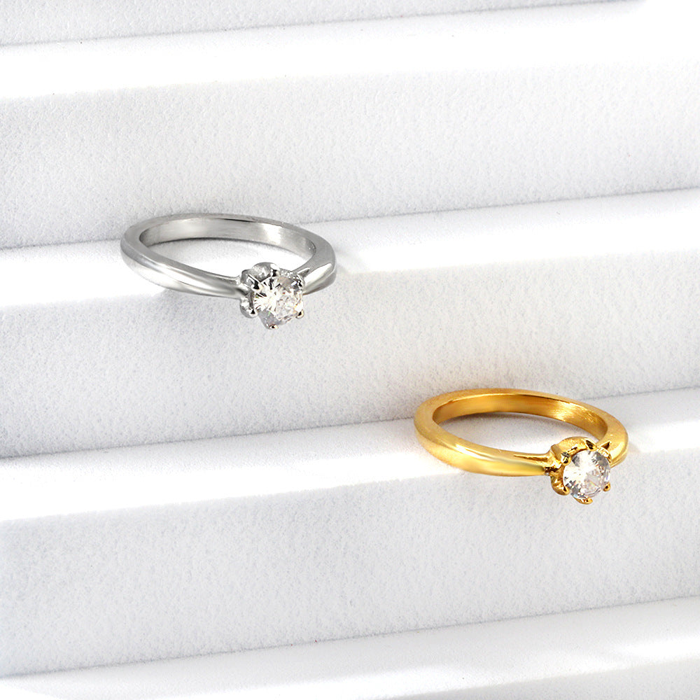 Damen Ring mit brillantem Zirkonia und eleganter Edelstahlfassung Shop Nory