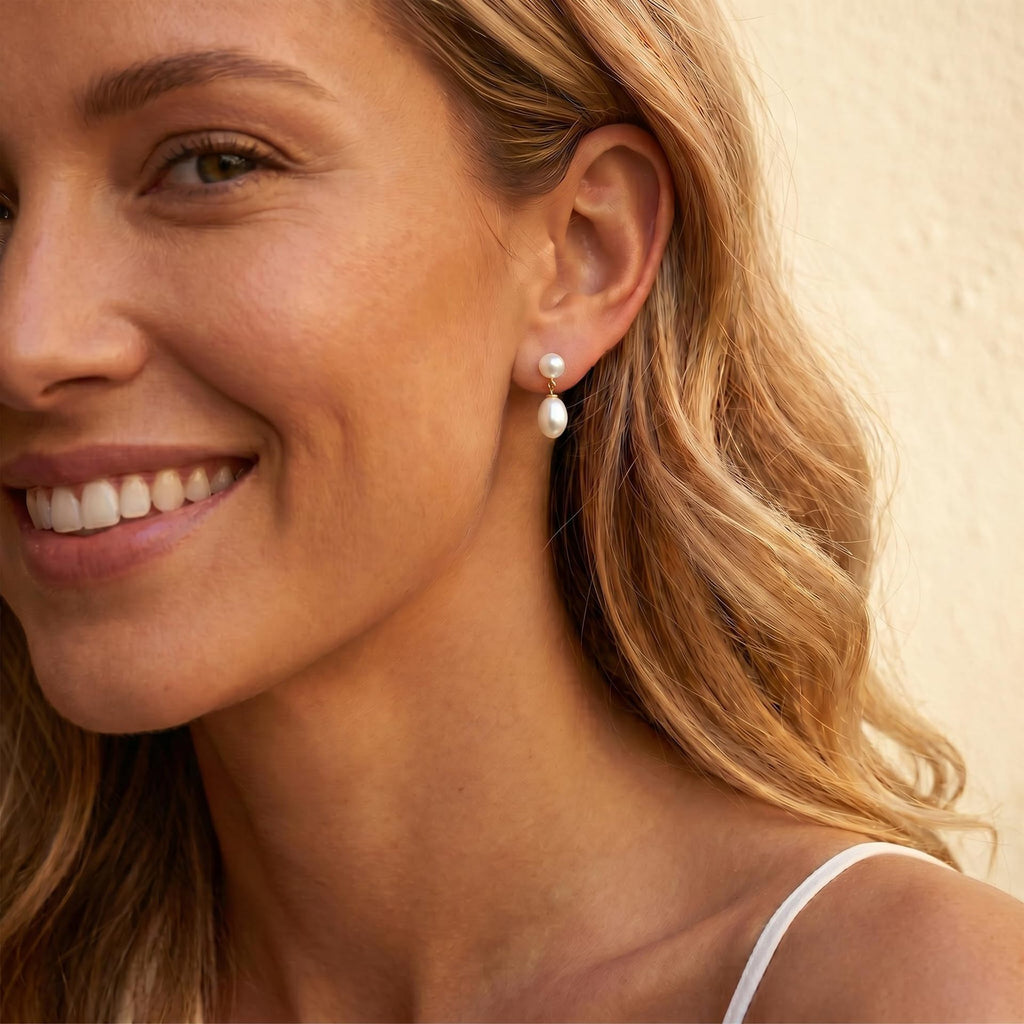 Damen Ohrhänger mit tropfenförmigem Perlenanhänger und funkelnden Kristallen Shop Nory
