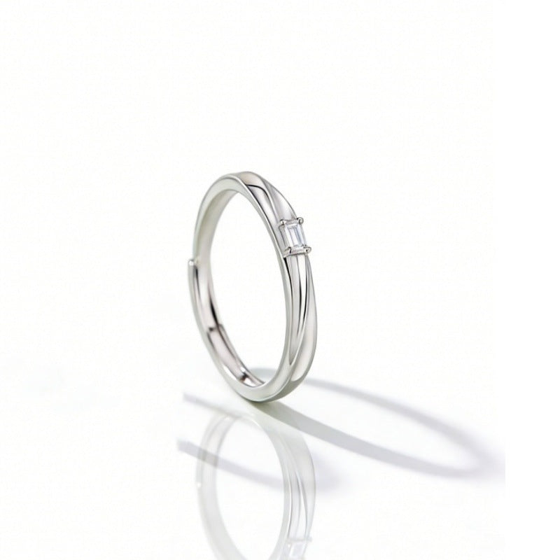 Damenring mit elegantem geschwungenem Design und funkelndem Akzent Shop Nory