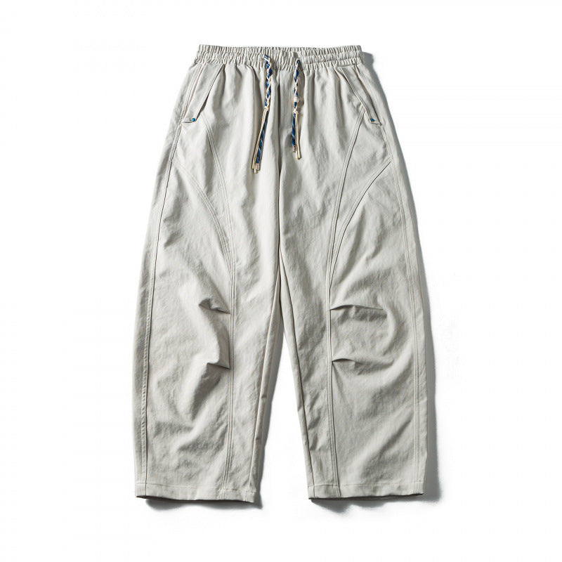 Unisex Weite Cropped-Hose mit Tunnelzug, elastischem Bund und markanten Nahtpaneelen Shop Nory