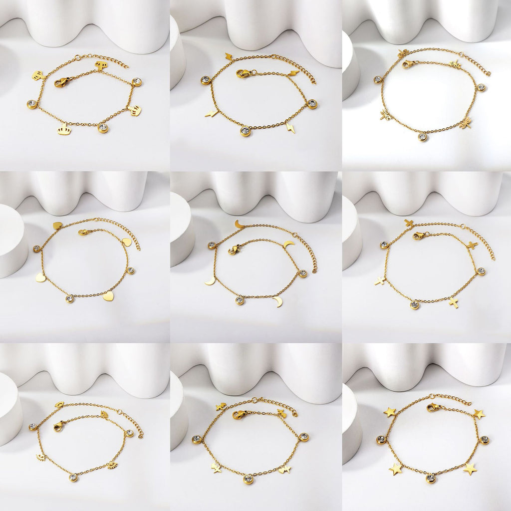Damen Armband mit funkelnden Zirkonia und handgefertigten Anhängern Shop Nory
