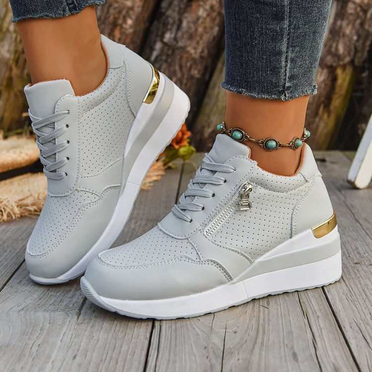 Damen Keil‑Sneaker mit seitlichem Reißverschluss, perforiertem Obermaterial und verstecktem Plateau Shop Nory