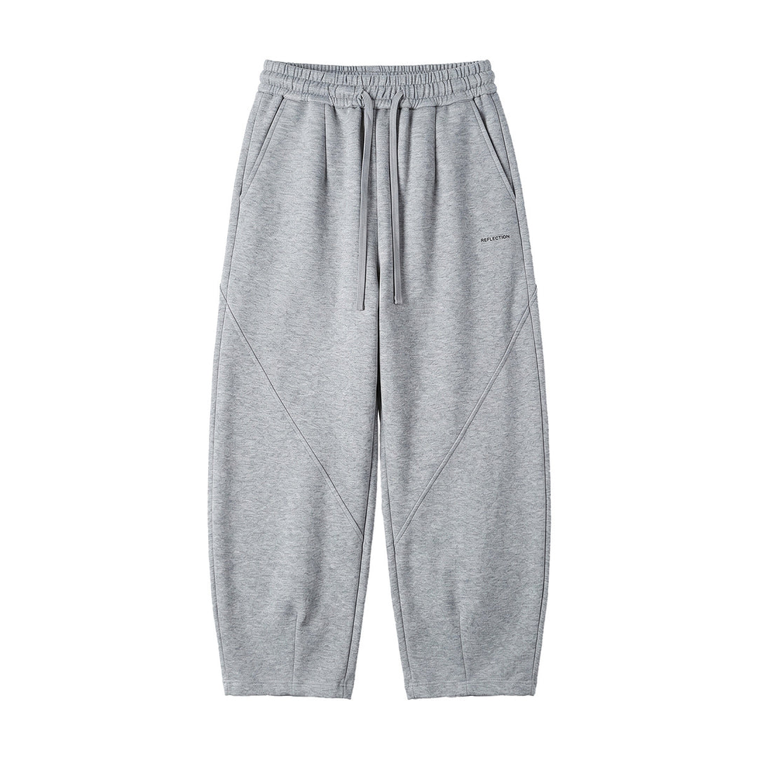 Herren Locker geschnittene Jogginghose mit Tunnelzug, Zierrnähten und Eingrifftaschen Shop Nory