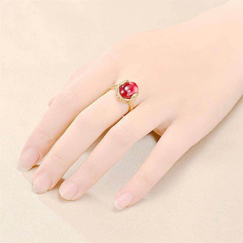 Damen Ring mit elegantem, ovalem rotem Stein und kunstvollem Design Shop Nory