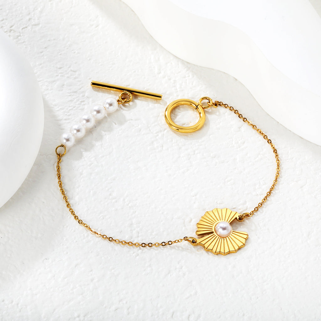 Damen Perlenarmband mit kunstvollem Muschel-Design und elegantem Toggleverschluss Shop Nory
