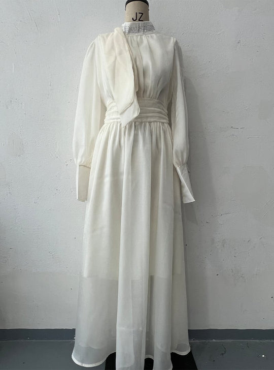 Damen Elegantes Chiffon-Maxikleid mit tailliertem Wickelbund, Stehkragen und langen Puffärmeln Shop Nory